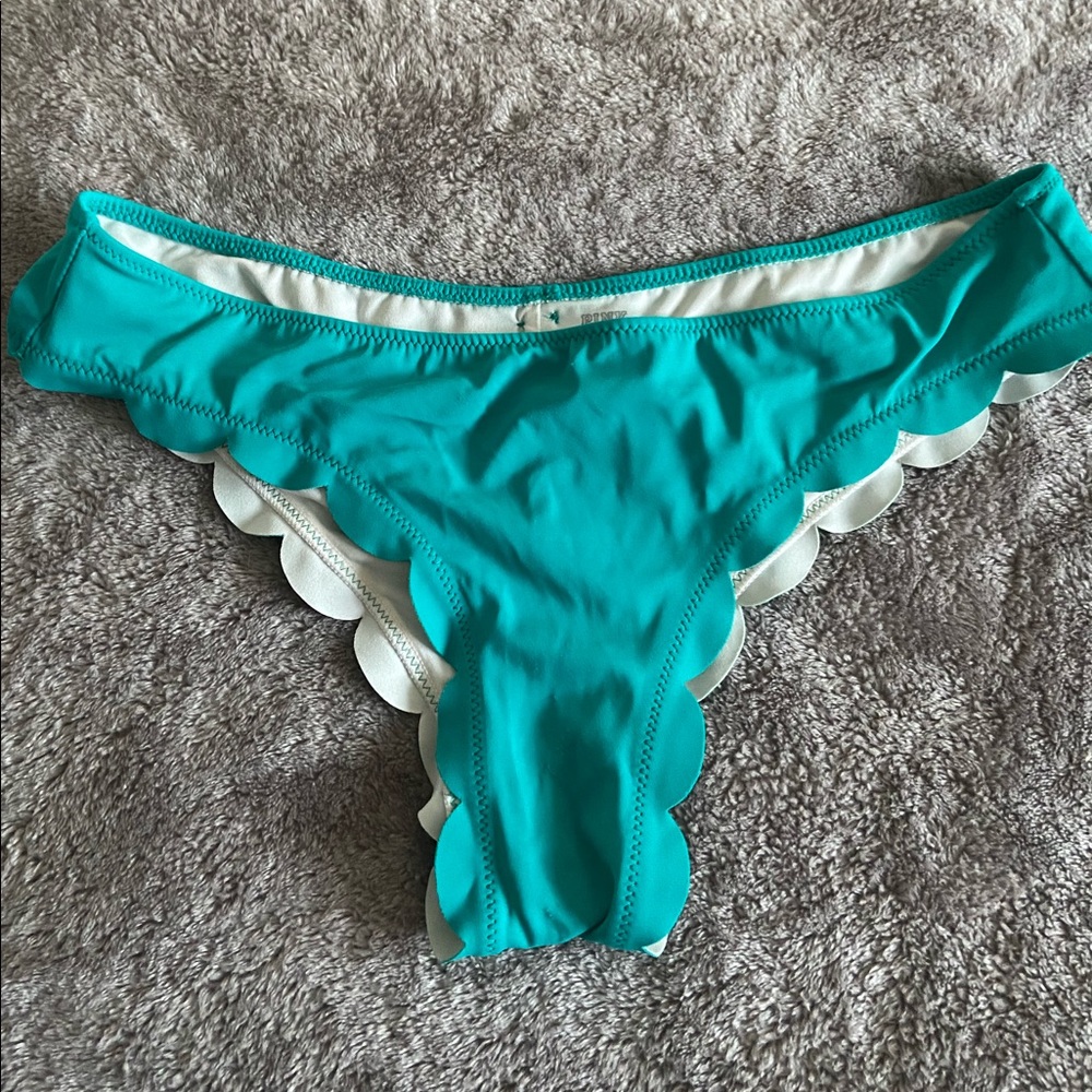 Pink Victoria’s Secret bathing suit bottom